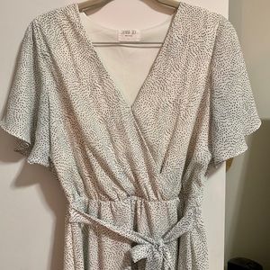 Cute faux wrap polka dotted dress